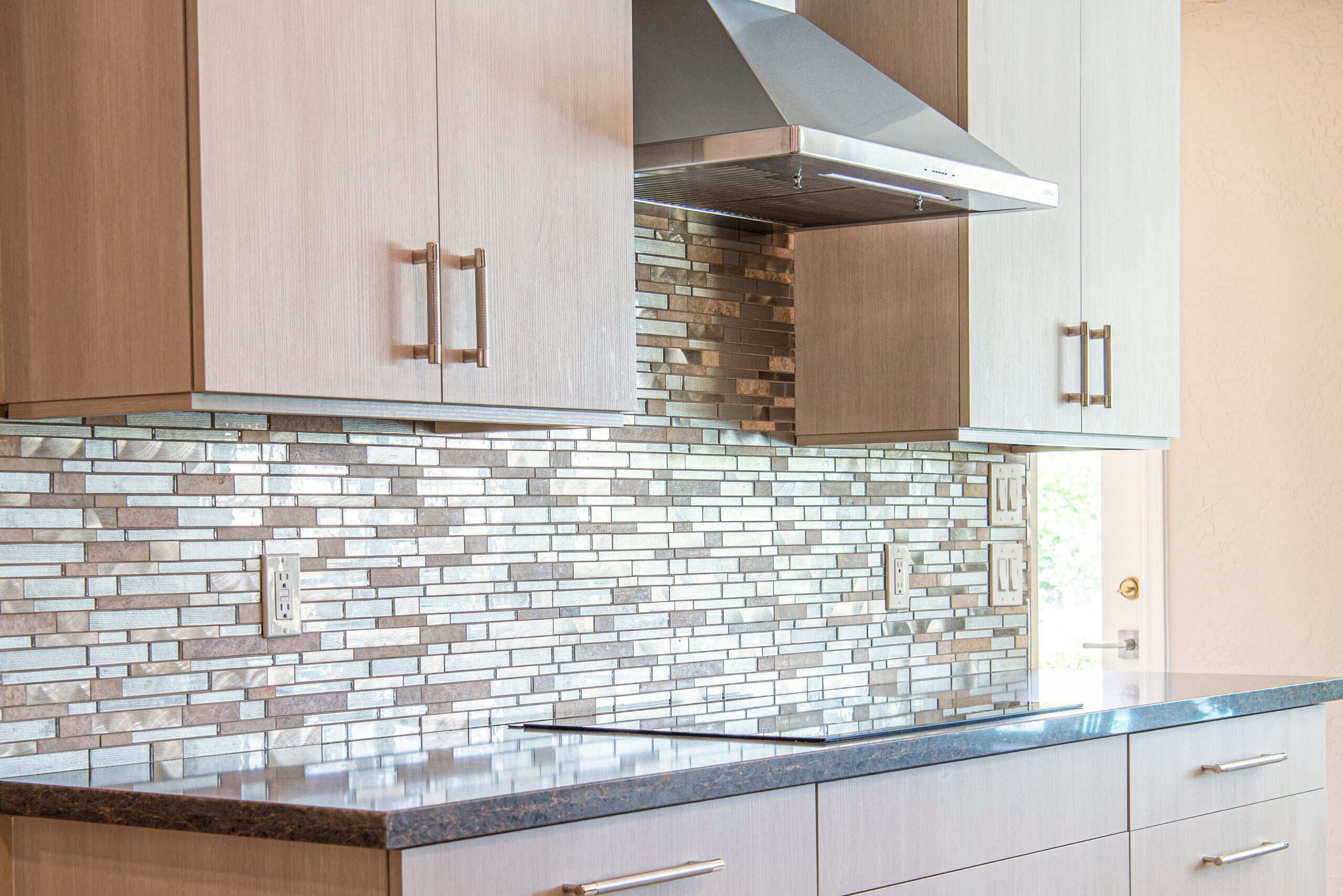 Stylish modern kitchen with elegant cabinets and sleek backsplash design